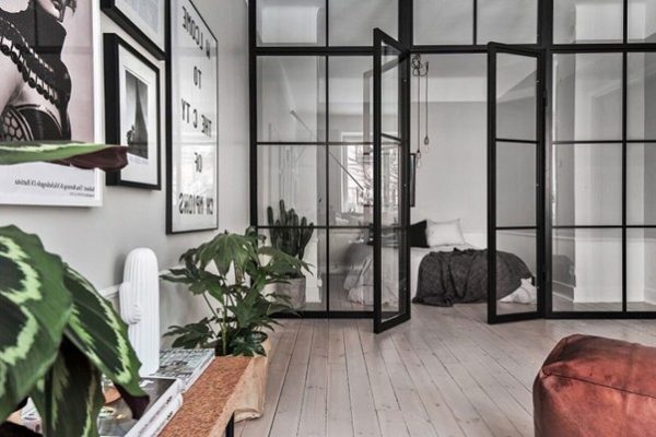 Partitions create a focal point for the bedroom