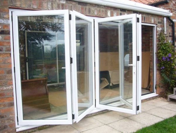 Model 5: Sliding folding door with large glass panels brings abundant natural light into the room